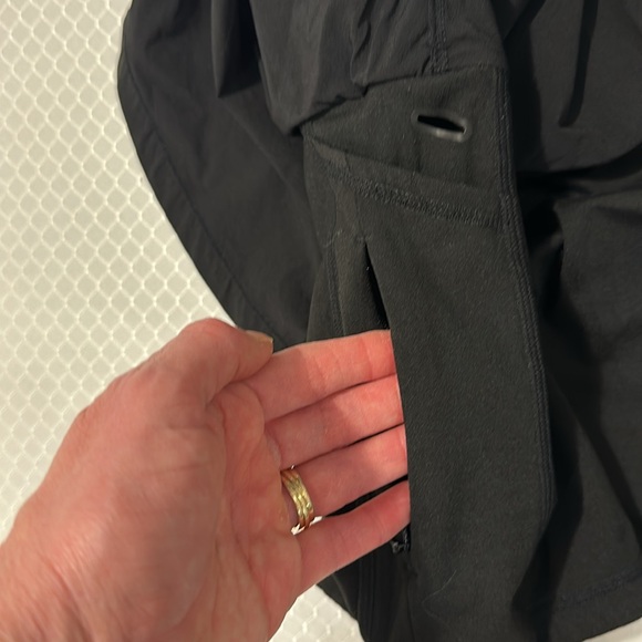 Black skirt with shorts underneath, side cell pockets in shorts, drawstring band - Picture 4 of 7